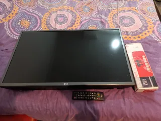 TV LG 32 32LH590U + soporte de pared