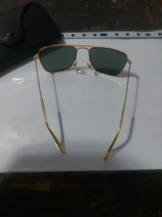 Gafas de sol Ray-Ban doradas y verdes