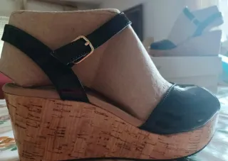 Sandalias Clarks cuña negras y marrones