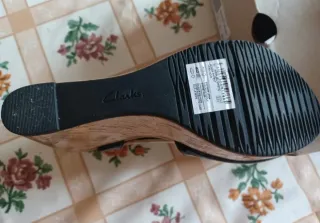 Sandalias Clarks cuña negras y marrones