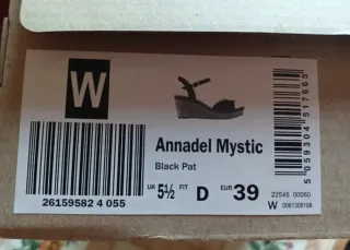 Sandalias Clarks cuña negras y marrones