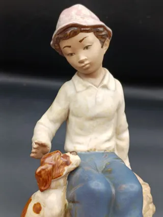 Figura porcelana Nao de Lladro Niño y Perro
