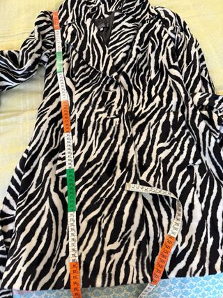 Cappottino zebrato peloso con cintura