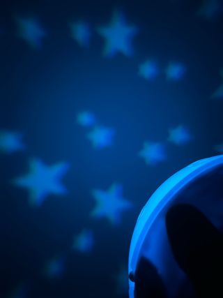 Proyector musical y luz nocturna Chicco