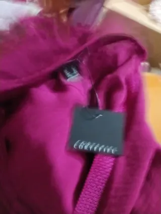 Blusa color berenjena muy amplia