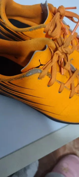 Botas multitacos fútbol niño naranja