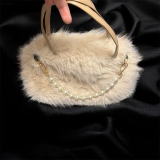 Bolso rosa empolvado efecto pelo · Nuevo