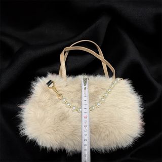 Bolso rosa empolvado efecto pelo · Nuevo