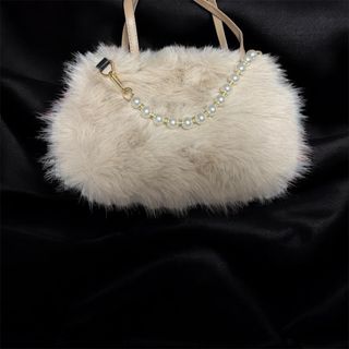 Bolso rosa empolvado efecto pelo · Nuevo