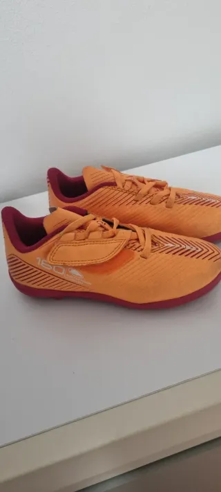 Botas de tacos fútbol niño naranja