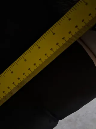 Chaqueta larga negra con cinturón