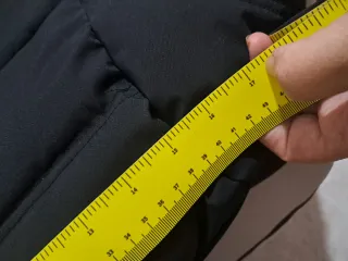 Chaqueta larga negra con cinturón