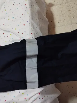 Mono de trabajo azul con reflectantes