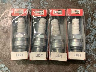 Set 4 Candele Champion L82Y NUOVE
