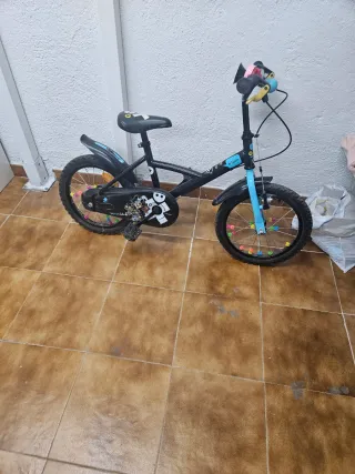 Bicicleta niño 14 pulgadas o cinco años