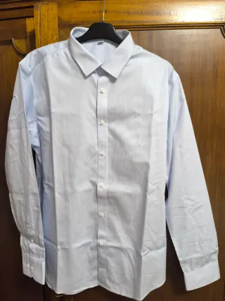 Camisa de hombre a rayas.Comprada grande