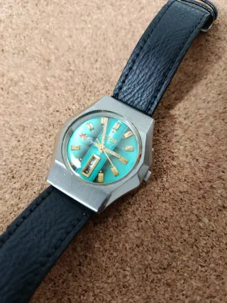 Reloj Ricoh Esfera Turquesa y Plata