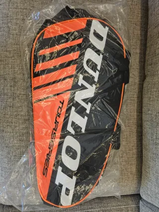 Paletero Dunlop Tourseries Naranja/Negro