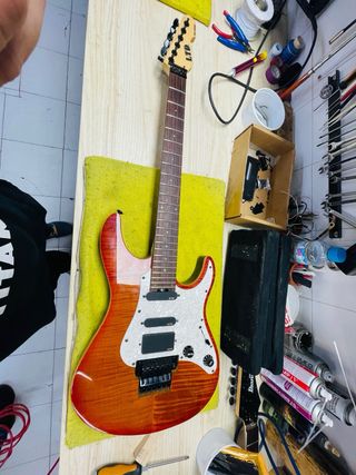 Ajuste de guitarras - Roma Luthier