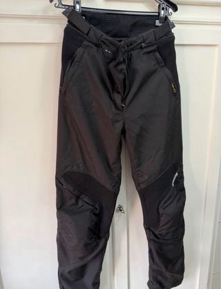 Traje de moto Dainese negro y azul