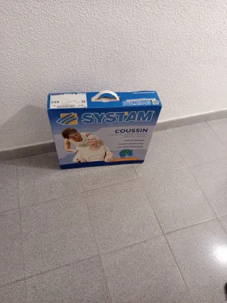 Silla de ruedas con cojín antiescaras