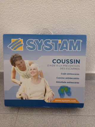 Silla de ruedas con cojín antiescaras