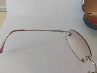 Gafas de sol Chanel sin montura rosas y plateadas