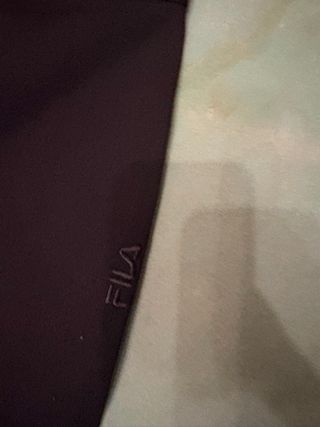 Pantaloni Fila neri con staffa