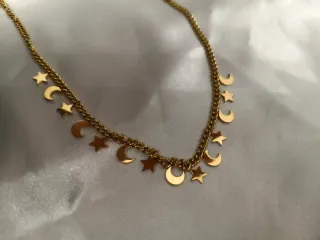 Collar acero con lunas y estrellas bañado en oro