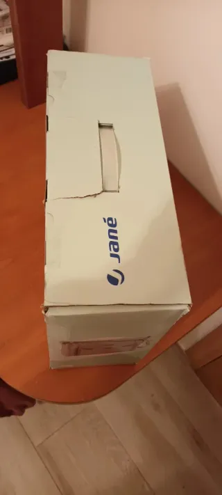 Asiento elevador Jané convertible en bolso