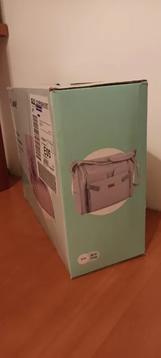 Asiento elevador Jané convertible en bolso