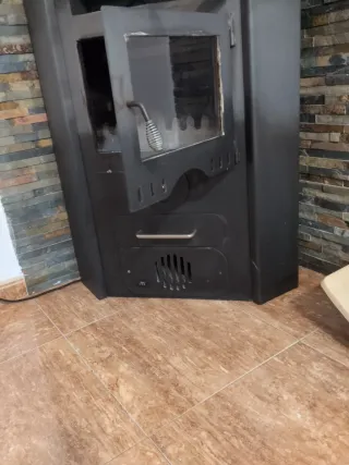 Estufa esquina leña/pellets hierro colado