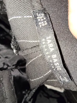 Pantalones formal negro con detalles plateado ZARA