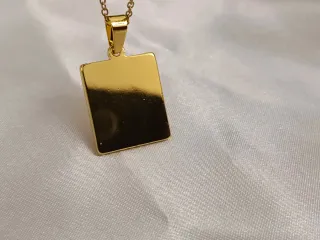 Collar de acero colgante sol bañado en oro 18K