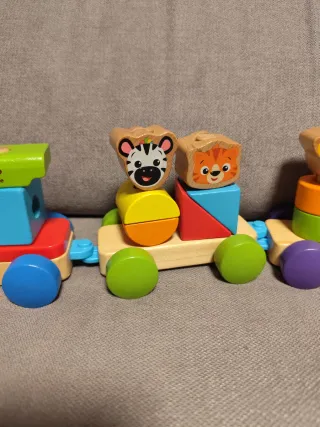 Lote 2 juguetes Hape Baby Einstein tren y arrastre