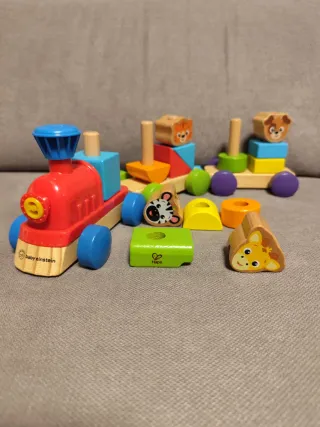 Lote 2 juguetes Hape Baby Einstein tren y arrastre