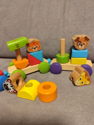 Lote 2 juguetes Hape Baby Einstein tren y arrastre