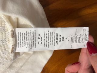 Maglione con cappuccio e frange