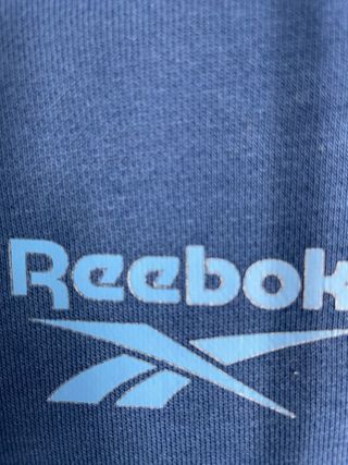 Hoodie Reebok azul marino unisex con bolsillo can