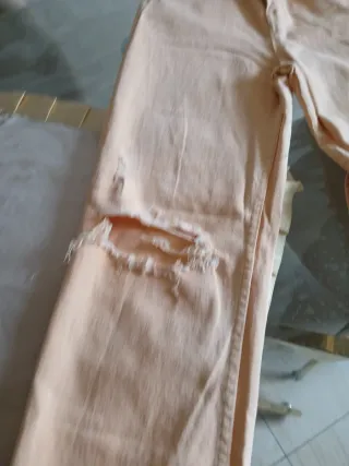 Jeans donna strappati color pesca