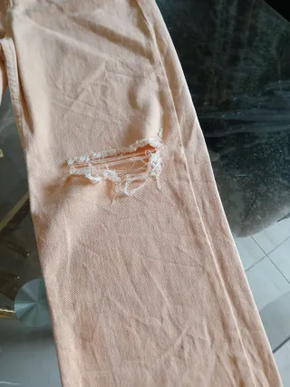 Jeans donna strappati color pesca