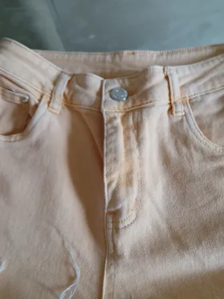 Jeans donna strappati color pesca