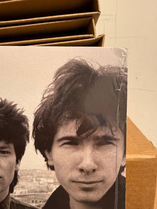 Vinilo U2 18 Singles Naranja target