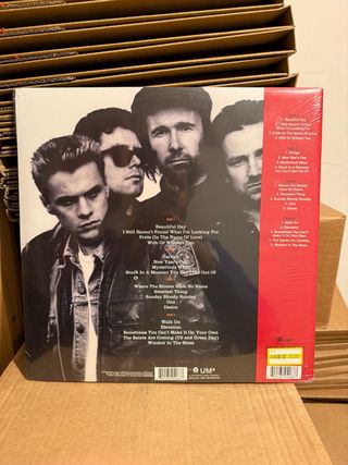 Vinilo U2 18 Singles Naranja target