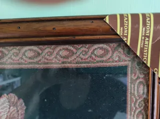 Arazzo con cornice in legno