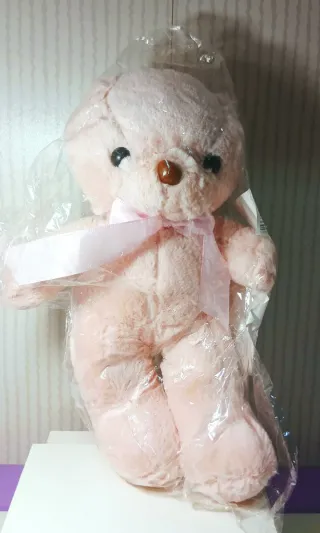 Osito de peluche rosa suave