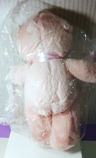 Osito de peluche rosa suave