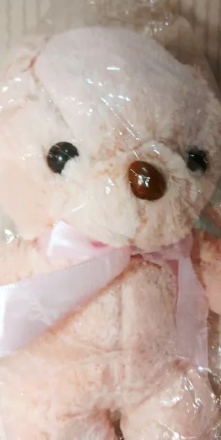 Osito de peluche rosa suave