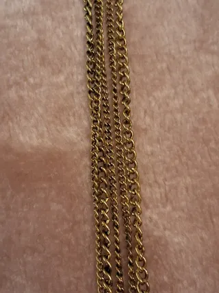 Collar largo metálico dorado con borla