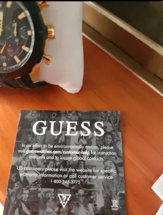 Reloj Guess Negro y Dorado